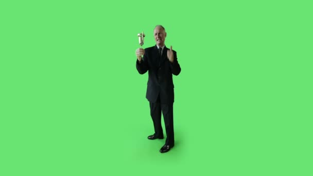 Senior businessman with trophy — Stock Video