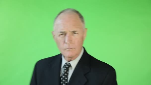 Senior businessman showing call me sign — Stock Video