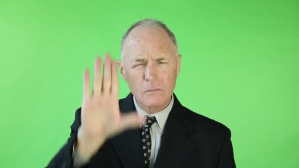 Senior businessman showing stop hand gesture — Stock Video