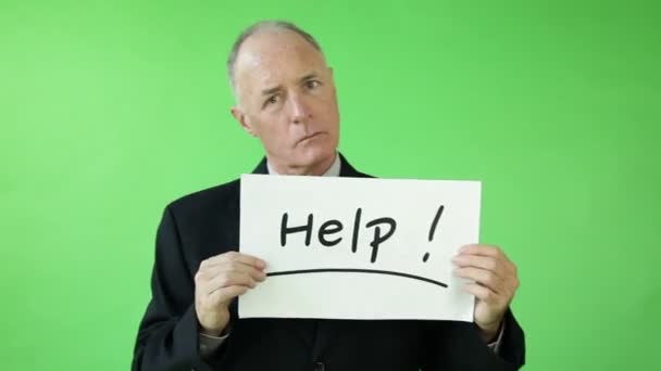 Senior businessman with help sign — Stock Video