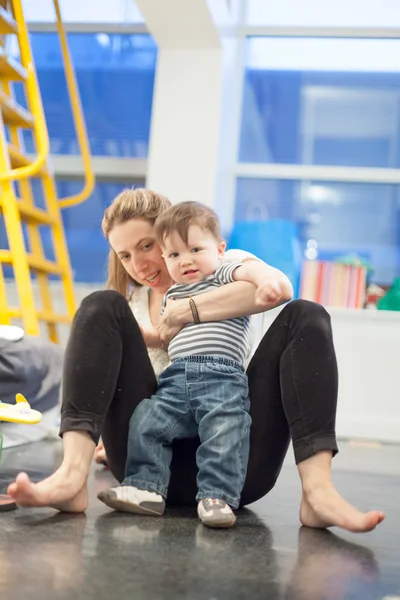 Mother hugging the son — Stock Photo, Image