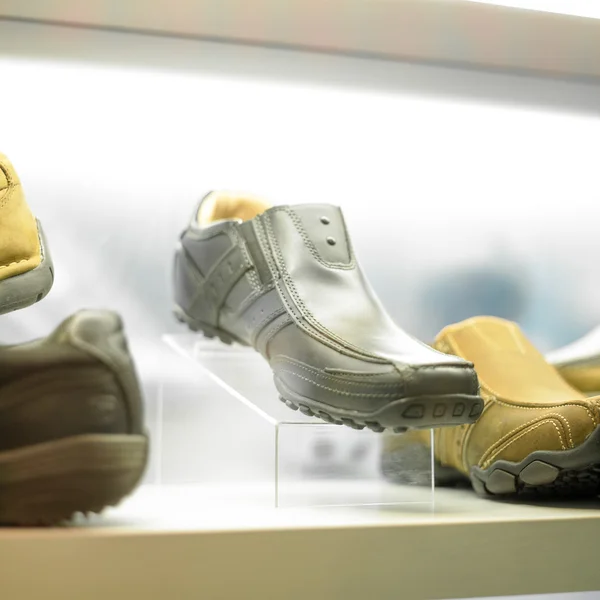 Shoe on showcase — Stock Image Shoe on showcase Royalty Free Stock Images
