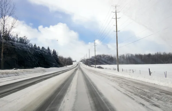 Estrada nevada — Fotografia de Stock