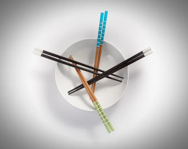 Chopsticks in bowl — Stock Photo, Image