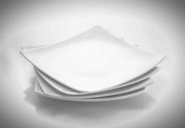 Stack of square plates — Stock Photo, Image