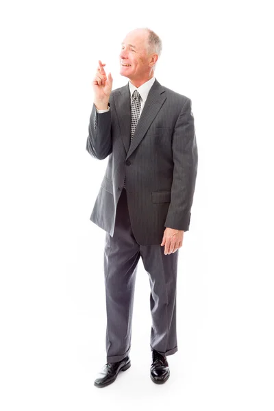 Businessman with fingers crossed for luck — Stock Photo, Image