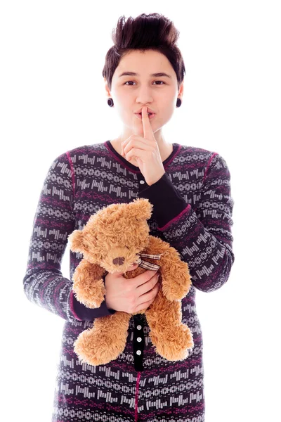 Vrouw met vinger op de lippen — Stockfoto