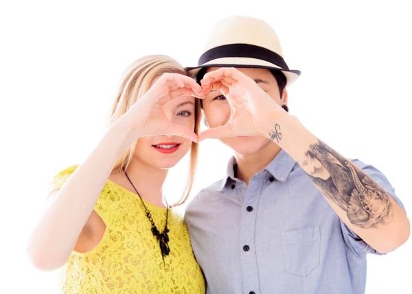 Pareja haciendo forma de corazón —  Fotos de Stock