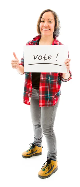 Kobieta pokazano głosowania znak — Zdjęcie stockowe