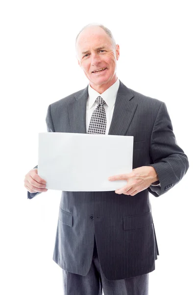 Businessman holding a blank placard — Stock Photo, Image