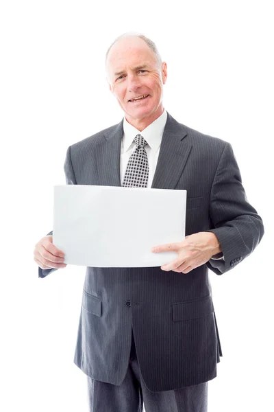 Empresário segurando um cartaz em branco — Fotografia de Stock