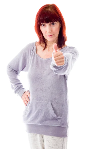 Žena ukazuje palec nahoru znamení — Stock fotografie