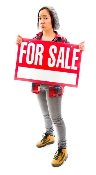 Saleswoman with for sale sign — Stock Photo, Image