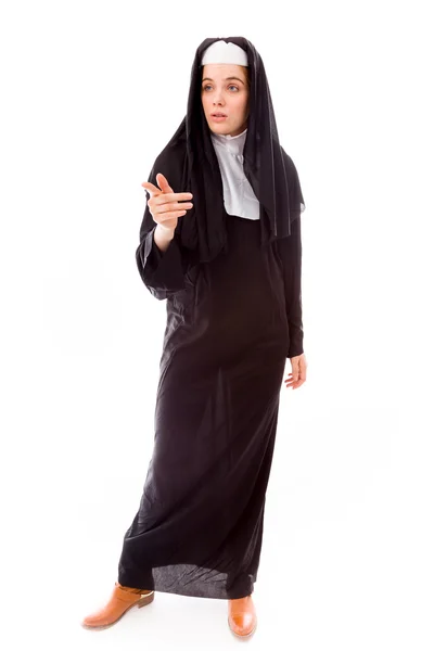 Nun pointing — Stockfoto