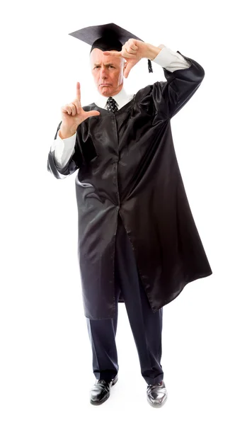 Graduate framing face with fingers — Stock Photo, Image
