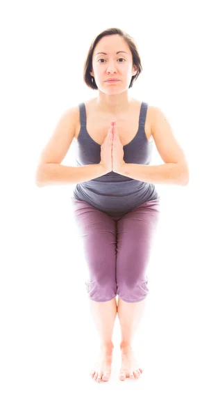 Woman in chair pose — Stock Photo, Image