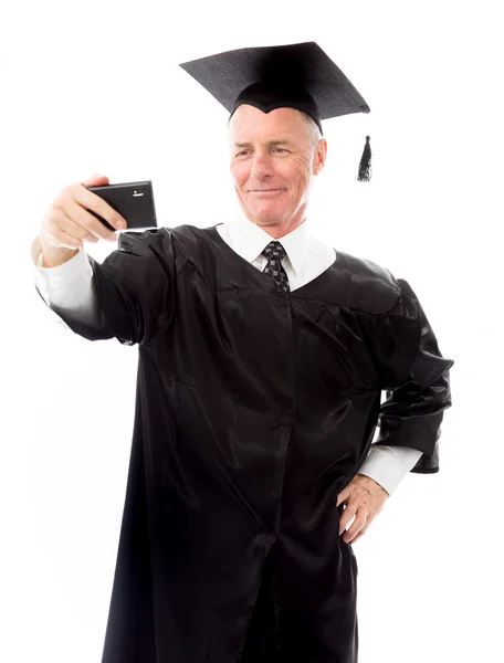 Graduado tomando fotos de sí mismo — Foto de Stock