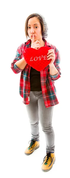 Mujer sosteniendo forma de corazón — Foto de Stock