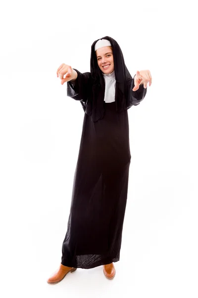 Nun pointing towards camera — Stock Photo, Image