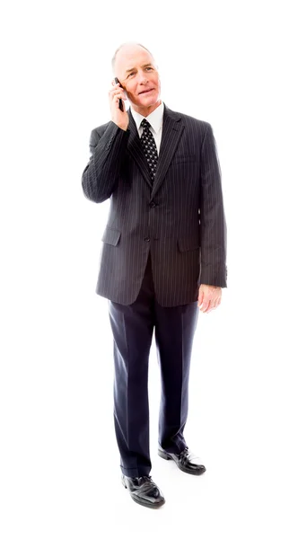 Talking on a mobile phone — Stock Photo, Image
