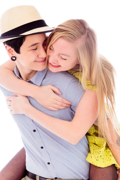 Woman giving her partner a piggy back ride — Stock Photo, Image