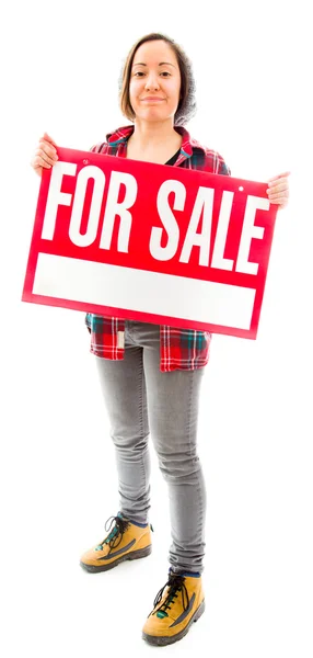 Saleswoman with for sale sign — Stock Photo, Image