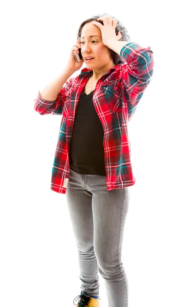 Woman talking on phone with  hand on head — Stock Photo, Image