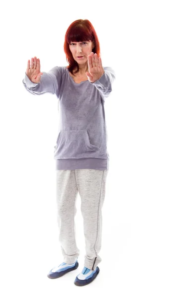 Mulher fazendo sinal de parar gesto — Fotografia de Stock