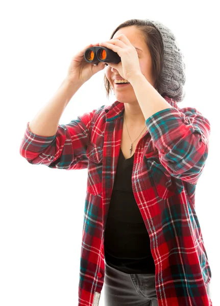 Woman looking through binoculars — Stock Photo, Image