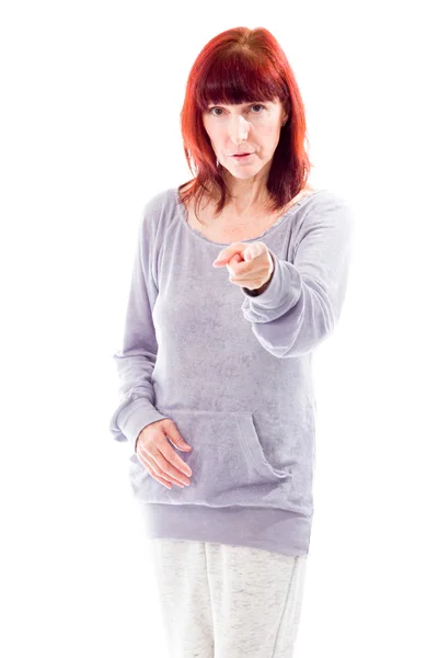 Woman pointing towards camera — Stock Photo, Image