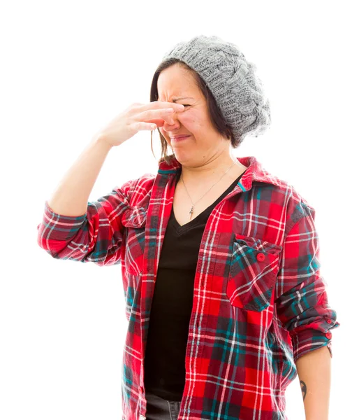 Vrouw knijpgrepen neus — Stockfoto