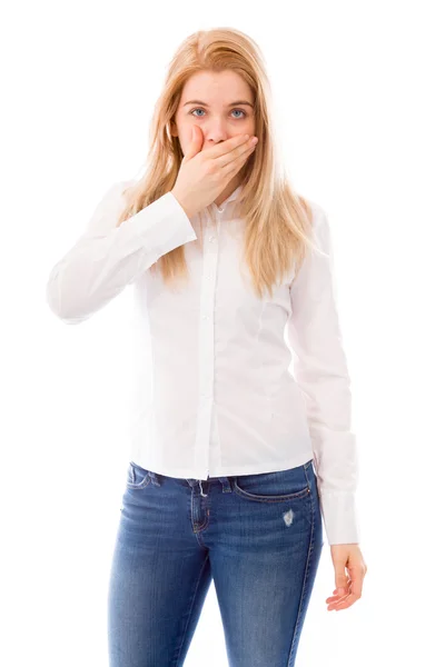 Woman with hand over  mouth — Stok fotoğraf