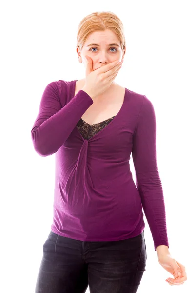 Woman with hand over mouth — Stok fotoğraf