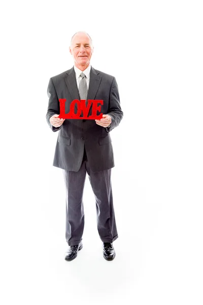 Businessman holding a  "Love" text — Stock Photo, Image