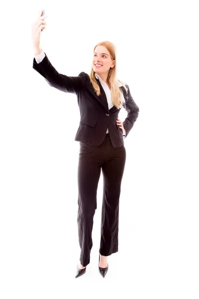 Businesswoman photographing herself — Stock Photo, Image