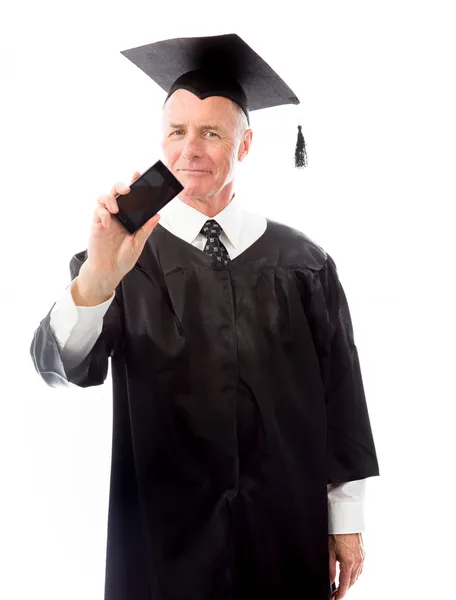Graduate showing a blank smart phone — Stock Photo, Image