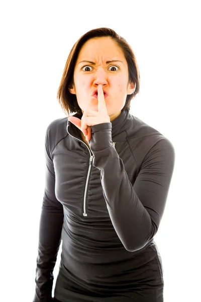 Mujer con el dedo en los labios —  Fotos de Stock