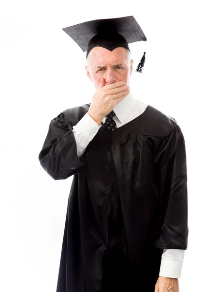 Graduate with hand over his mouth — Stock Photo, Image