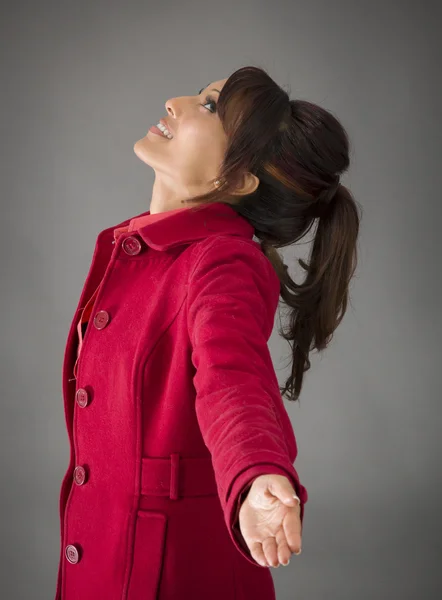 Woman with arms outstretched — Stock Photo, Image