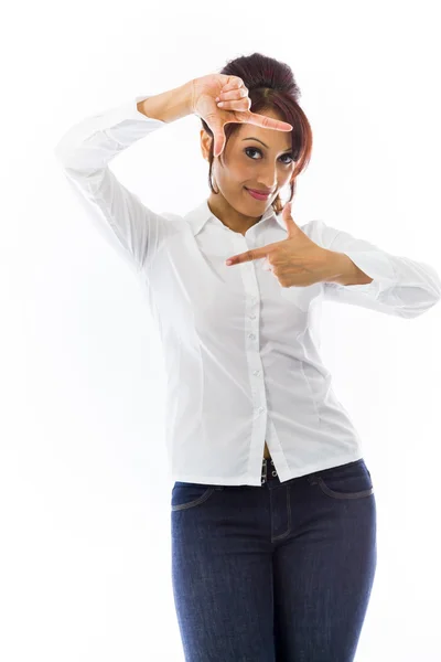 Woman looking through fingers frame — Stock Photo, Image