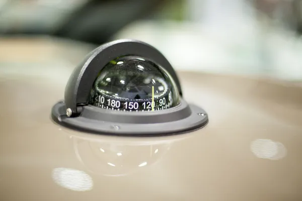 Compass in a speedboat — Stock Photo, Image