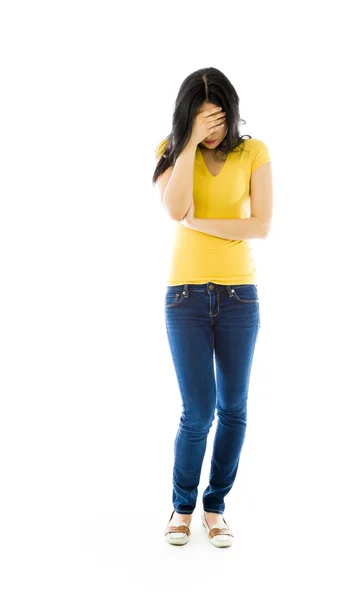 Vrouw met haar hoofd in de hand — Stockfoto