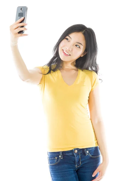 Woman photographing herself — Stock Photo, Image