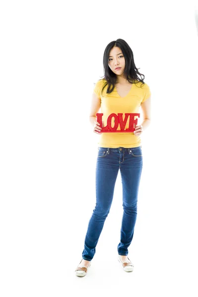 Žena držící "love" text — Stock fotografie