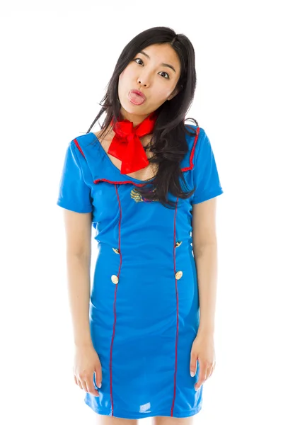 Stewardess poking out tongue — Stock Photo, Image