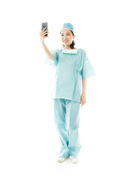 Chirurg fotografuje sama sebe — Stock fotografie