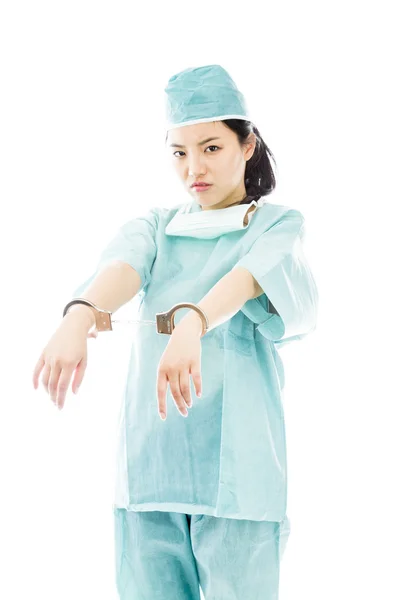 Surgeon with handcuffed hands — Stock Photo, Image