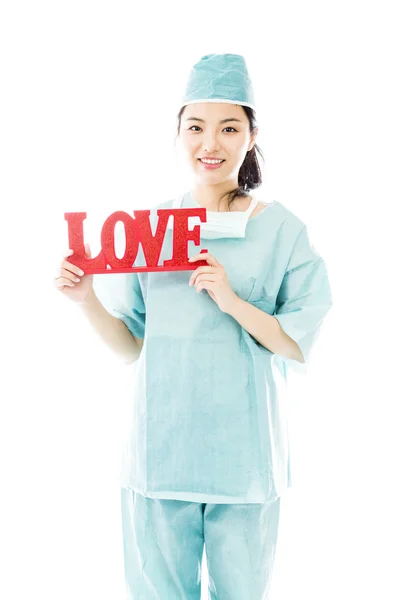 Surgeon with "LOVE" text — Stock Photo, Image