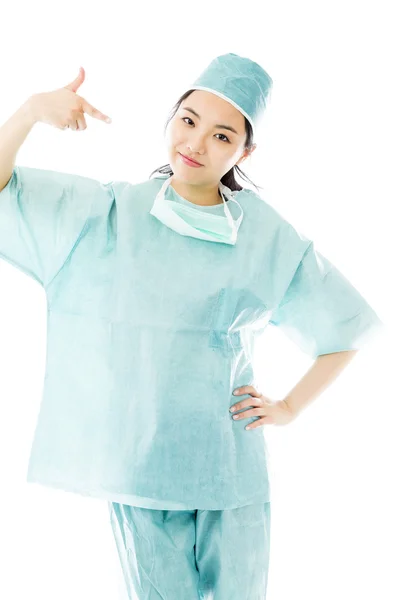 Surgeon pointing at herself — Stock Photo, Image