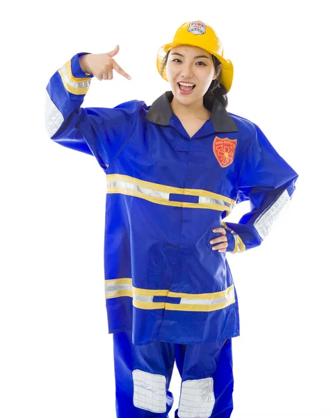 Firefighter pointing at herself — Stock Photo, Image